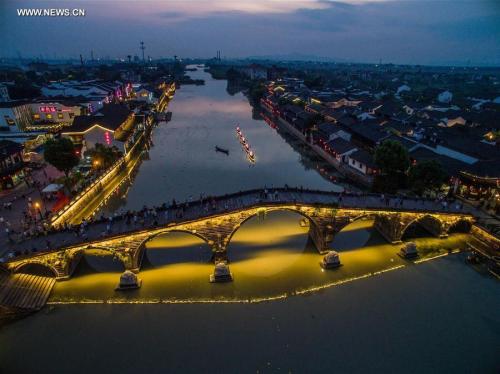 Host city of Hangzhou lights up to welcome visitors