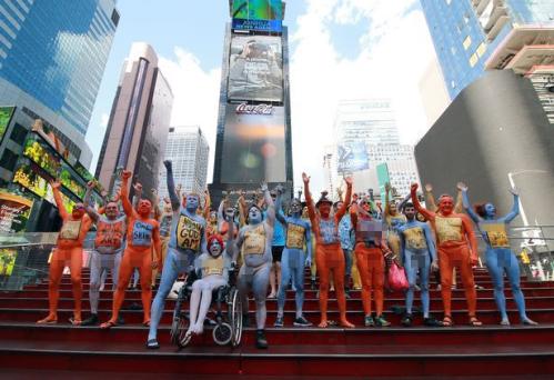 Nude body painting exhibits in Time Square