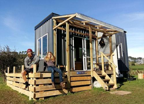 Couple turn rusty boat trailer into transportable home