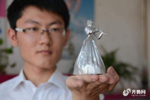 High school student admitted into college by paper folding t